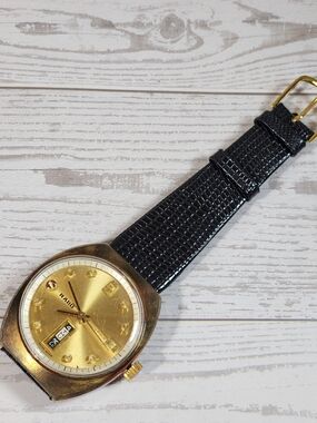 Vintage Rado Men’s Gold Dial Watch – Classic Elegance with Black Strap